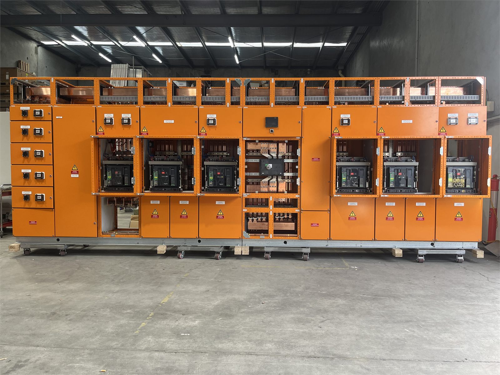 Large custom orange switchboard manufactured by Bartech